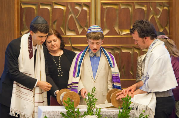 In a bizarre case over a grandmother's Bar Mitzvah gift for her grandson, a 20-year-old man successfully sued his own mother for the $5,000 that was promised to him when he became a man at age 13.

A judge ruled that Jordan Zeidman was entitled to the Bar Mitzvah gift from his grandmother that his mother was apparently holding for his college fund. Zeidman's parents divorced in 1998 and agreed to contribute to their son's college fund, according to Nassau County judge Scott Fairgrieve's ruling.

Among the evidence Fairgrieve cited was Zeidman's testimony that at his Bar Mitzvah in October 2007, his grandmother said, "I have $5,000 for you. Just like I gave to your brother and sister. And I'm going to give it to your mom to hold for you."