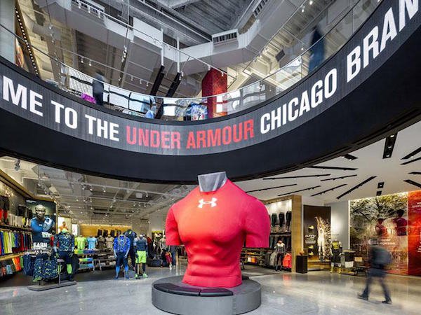 Under Armour.
According to CEO Kevin Plank, the added the “u” because it gave them an easier phone number. “The reason we added the ‘U’ in ‘Armour’ is that I was skeptical at the time about whether this whole internet thing would stick,” Plank told The Post. “So I thought the phone number 888-4ARMOUR was much more compelling than 888-44ARMOR. I wish there was a little more science or an entire marketing study behind it, but it was that simple.”