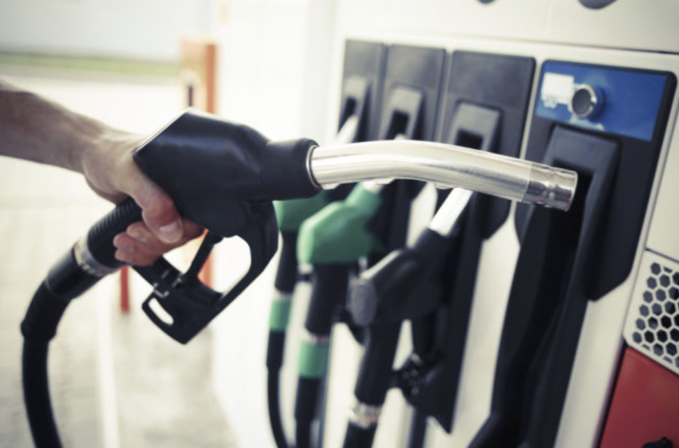 If the handle is broken on the gas pump you're using, wedge your gas cap in there for hands-free pumping.