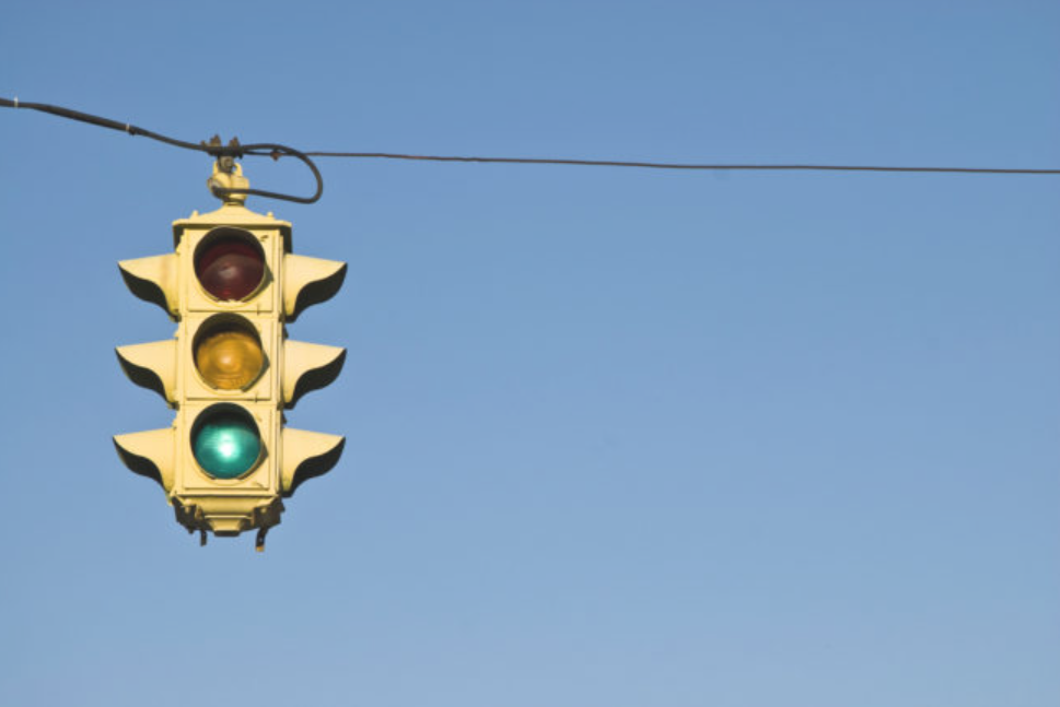 The length of a yellow light is 10 percent of the speed limit. To figure out how much time you have, keep that in mind. If the speed limit is 40 miles per hour, you have four seconds until it turns red.