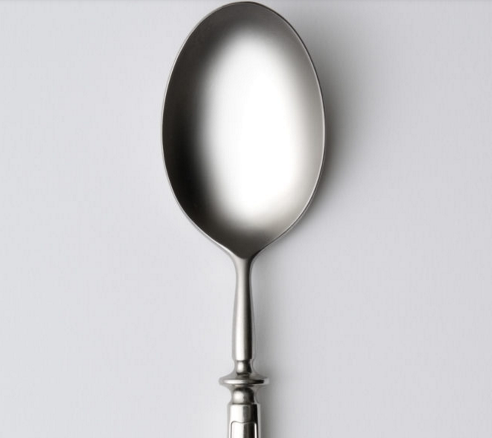 Run a metal spoon under warm water. Once it's heated up, place it over a bug bite to stop it from itching.