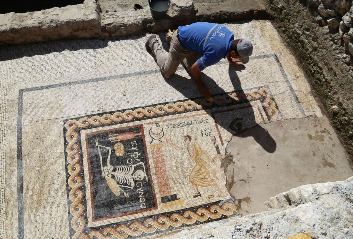 Archeologists digging in the Turkish-Syrian border discovered 2,400-year-old mosaic skeleton.
The mosaic had an important message in it, "Be cheerful and live your life."