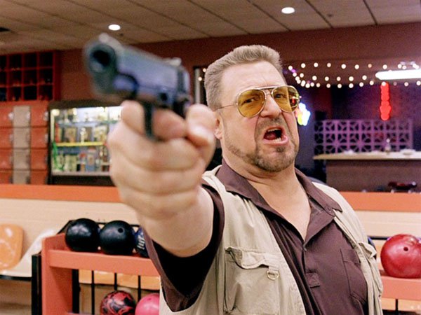 The Big Lebowski.
The gun that Walter pulls in the bowling alley is a Colt model 1911 .45 caliber semi automatic handgun. Standard U.S. military side arm during the Vietnam War.
