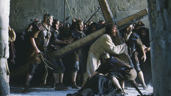 The Passion of the Christ.
Jim Caviezel experienced a shoulder separation when the 150lb cross dropped on his shoulder. The scene is still in the movie.