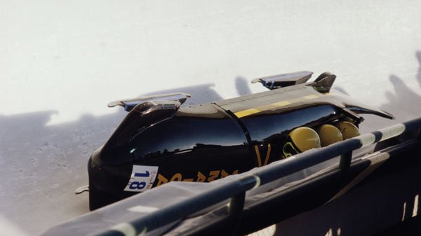 Cool Runnings.
The crash scene at the end of the movie, except for the close-up shots, was the real footage of the actual Jamaican bobsled team crash taken from the 1988 Winter Olympic Games.