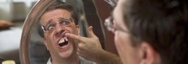 The Hangover.
No effects or prosthetics were created for Stu’s missing tooth. Actor Ed Helms never had an adult incisor grow, and his fake incisor was taken out for the parts of filming where Stu’s tooth is missing.