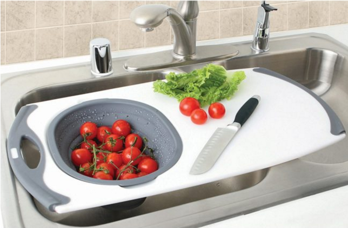 Cut down on the mess in your kitchen sink with this strainer/cutting board combo.