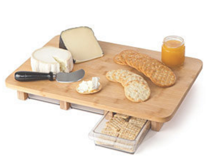 This serving board will allow you to store extra snacks underneath.
