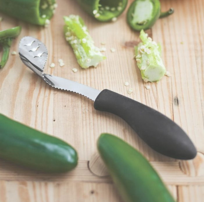 Quickly remove seeds from peppers with this specially designed serrated knife.
