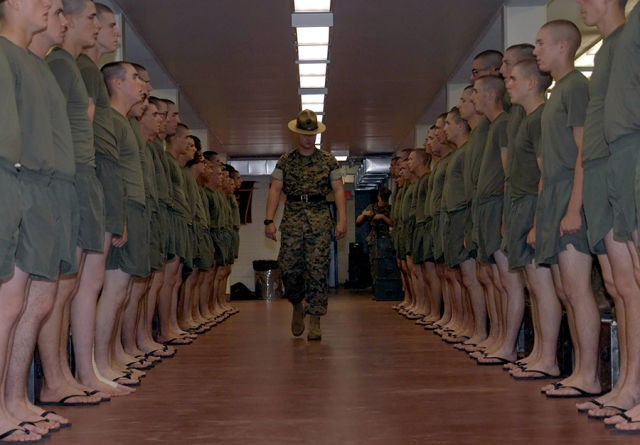 U.S. Marine Drill Instructor Inspects His Platoon Shortly Before Lights Out At MCRD Parris Island, South Carolina