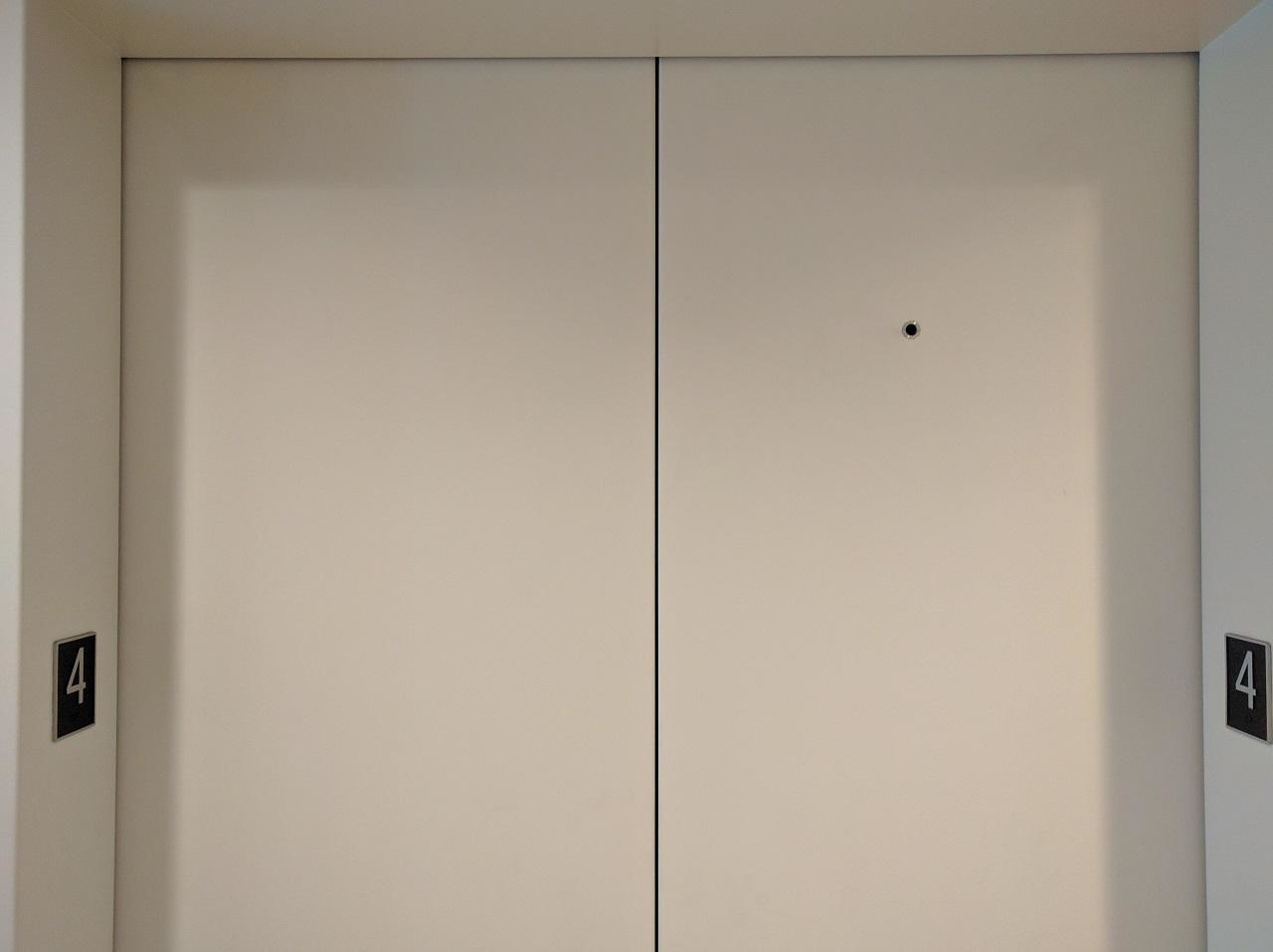 That Tiny Hole On Elevator Doors.
No, it's not there so any perve can take a peek at strangers on the elevator. It's a keyhole that only works for authorized personnel that allows them to enter them safely.