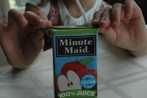 Juice Boxes.
That's not how you do it! No wonder you keep spilling! Pull the sides of your juice box so that you can hold the box without pressing so much it ends up spilling. Yeah, unbelievable!