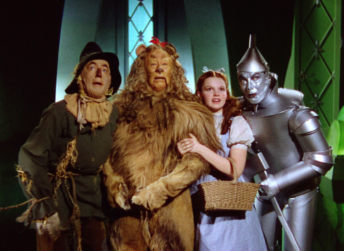 On the set of the Wizard of Oz, the actors playing the Scarecrow, Tin Man, the Cowardly Lion, and the Wizard resented being “upstaged” by a woman and refused to even talk to Judy Garland between takes. The only friend Garland made on set was Margaret Hamilton, who played the Wicked Witch.

From the very beginning, studio executives were worried that Judy Garland was too fat to play a happy-go-lucky Kansas farm girl, so in an effort to prevent her lumbering, gelatinous ass from literally sinking the production, they put her in a corset and shoved amphetamines down her throat hand over fist. She was 16 at the time, but this was the 1930s, when forcing children into meth addiction was standard Hollywood practice. As opposed to today, where it’s totally different. (We use prescription pills now.)
MGM executive Louis B. Mayer was so committed to making sure Garland got down to an acceptable weight that he had people follow her around to make sure she wasn’t cheating on her diet. That diet, by the way, consisted of chicken soup, coffee, and … 80 cigarettes a day. Holy fuck, 1930s.
Garland’s co-stars didn’t treat her any better, either. The actors who played the Scarecrow, the Tin Man, the Cowardly Lion, and the Wizard refused to even talk to her between takes, insisting that they were serious actors and resented playing second fiddle to a woman. Even on screen, they would attempt to shove her to the back of the scene like a bunch of schoolyard bullies. Ironically, the only friend she made on set was Margaret Hamilton, who played the Wicked
Director Victor Fleming was an utter bastard, too. Garland had an unfortunate habit of laughing at Bert Lahr’s (Cowardly Lion) antics during filming, so Fleming would have to occasionally take her into the back and slap the humor out of her. The fucking Land of Oz is no place for whimsy