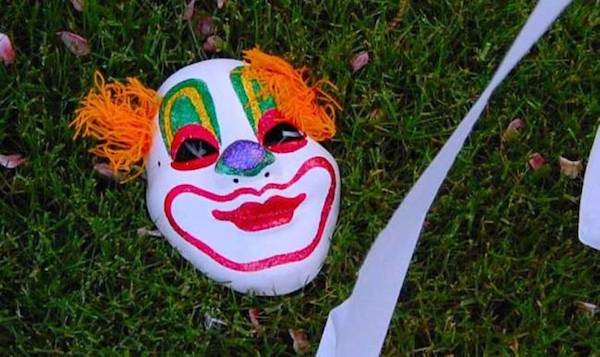 A Reading, Ohio school district was closed in late September 2016 after a threat was made against students by a clown. 

The threat was made when a woman was assaulted by a malewho was dressed as a clown near the school. The victim was on her porch when she was approached from behind by the clown, who put her in a headlock, and said, "I should just kill you right now" and threatened the schools. A neighbor's smoke alarm going off scared her attacker into fleeing, and she called 911. 

No arrest has been made so far, but police believe the clown was a juvenile.