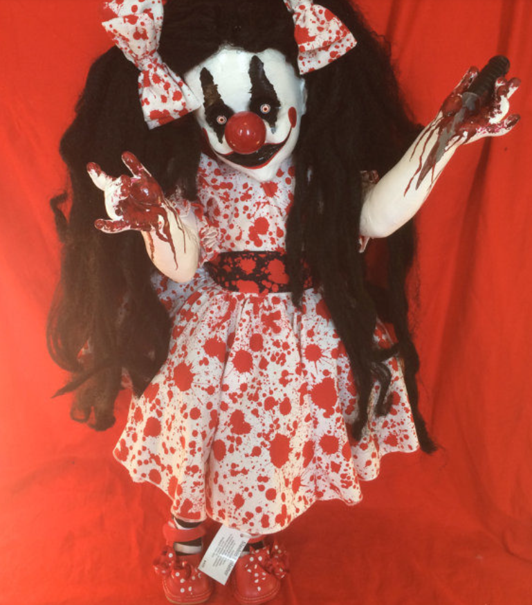 How would you ever sleep with this horrifying clown doll in your house?