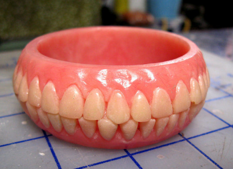 Dentures are already unsettling enough without being turned into bracelets.