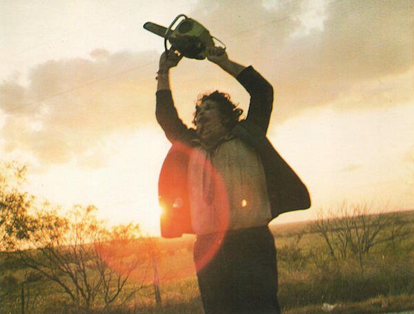 The Texas Chainsaw Massacre.
One of the first films to really set the stage for the Torture Porn genre, ‘The Texas Chainsaw Massacre’ was a pretty shocking film for its time. With teenagers getting hung on meathooks and a psychopath wearing someone else’s face while chasing people down with a chainsaw, it was enough to make 70’s audiences run from the theatre screaming.