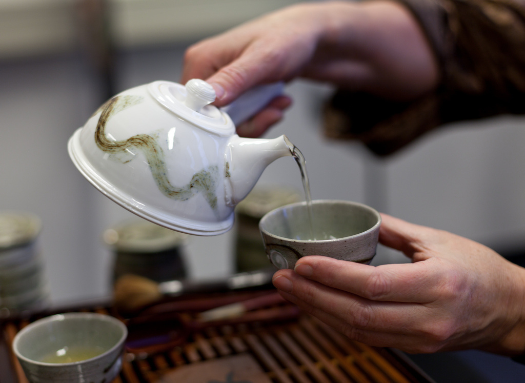 During the 19th century when someone was pouring tea, they were known to be "bitching the pot." Isn't old time slang great!