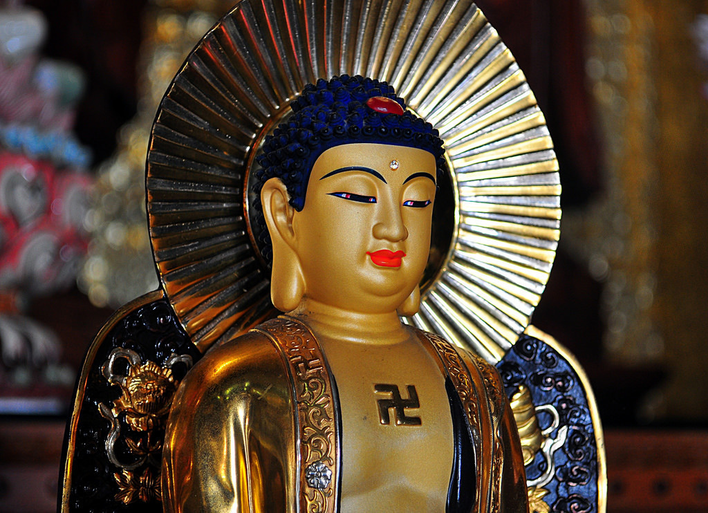The Swastika is widely known as a symbol of hatred and is considered very offensive. That's not the case however for Jainism, Buddhism and Hinduism. They see it as a symbol of auspiciousness.