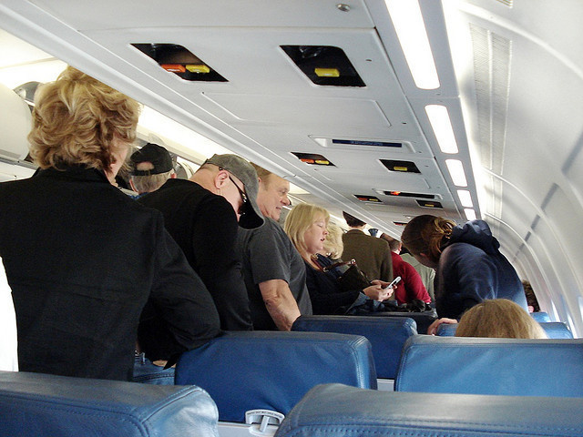 When the seats are all in the upright position it creates more room to move. This is important for speed if the plane needs to be evacuated.