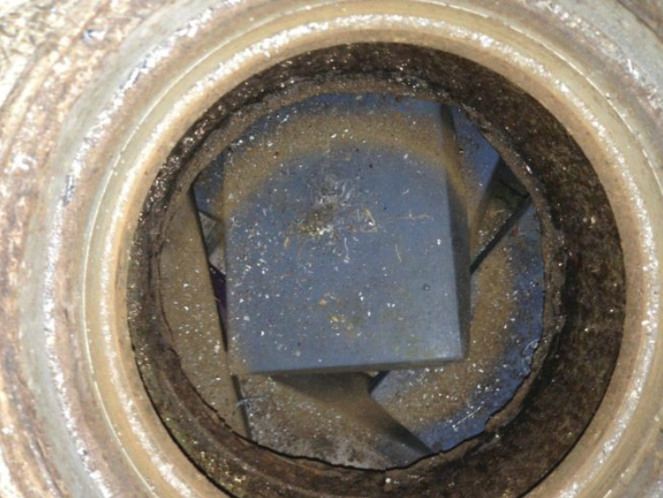 At first, he saw what looked like a pile of wet bricks. He remembered that there had been a pipe leak in his grandparents' house a few years ago, and concluded that some water had gotten into the safe.