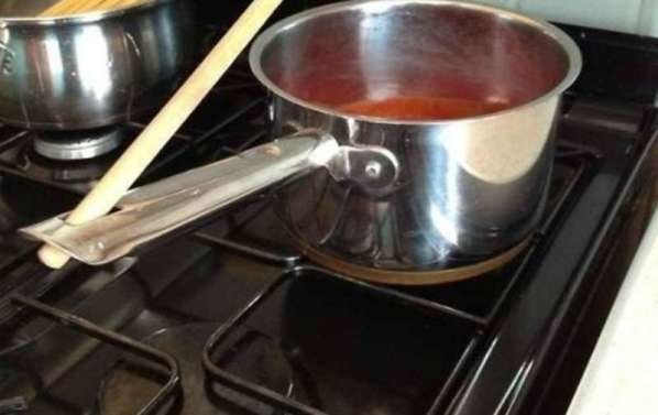 The Hole on the Handles of Pots And Pans.
Chefs sometimes use the hole to hang their pots and pans (great space saving tip) but you can also use it to leave your spoon as your dish simmers, assuming that it will fit.