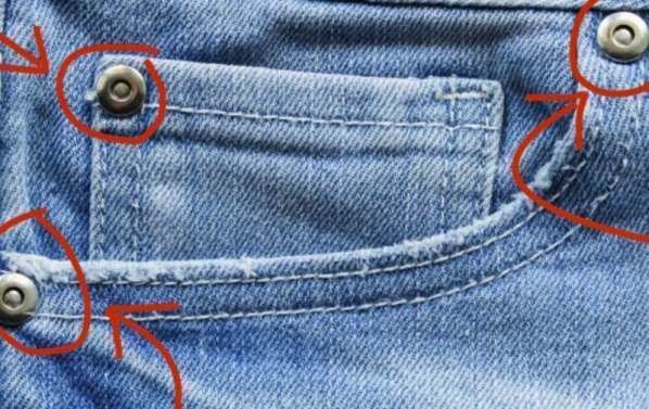 Miniature Pocket and Rivets on Jeans.
The smallest pocket in your jeans could barely fit your finger and that's because it was originally meant for a pocket watch. As for the rivets, they look like pointless buttons but they're actually there to reinforce the seams of the pockets. Pockets are vulnerable to rips so this greatly improves the item's endurance.