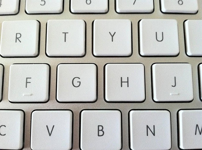 Bumps on the 'F' and 'J' Keys.
These bumps help keep you in line with 10-finger typing. They indicate where the index fingers should rest so you can feel for them rather than looking down, especially if you've got a lot to type.