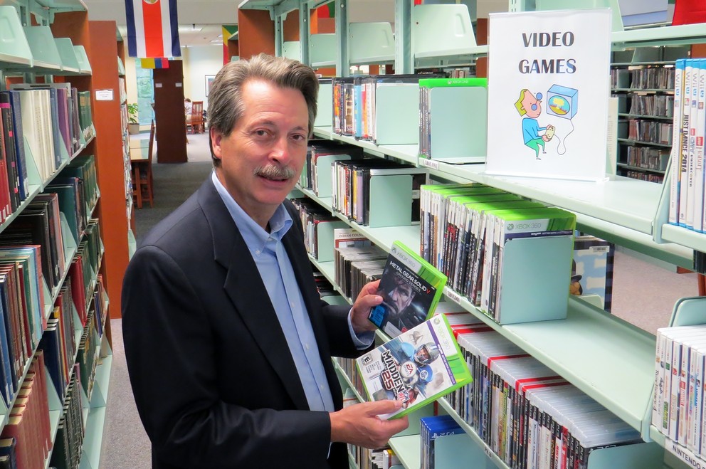 Many American public libraries carry video games as an attempt to lure teenagers into a library. The result is more teenagers coming to the library and books are being checked out at a rate that exceeds what it was before the gamers arrived