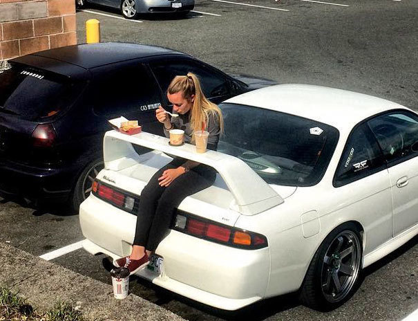 If your car has a spoiler, use it as a table to eat a quick meal or snack.