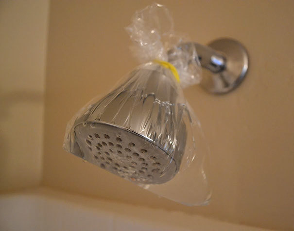 Shower heads can get dirty without you noticing. Clean them easily by tying a bag of vinegar around the shower head and leaving it there overnight.