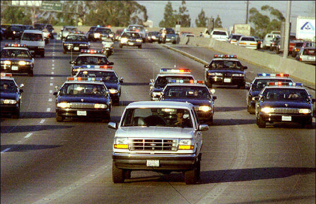 O.J.'s slow car chase.
Before the world watched O.J. Simpson getting away with murder on live television, they watched live as he led police on a slow car chase when they were trying to take him into custody. The live coverage of the event consumed the nation as everything seemed to come to a halt so the world could watch.