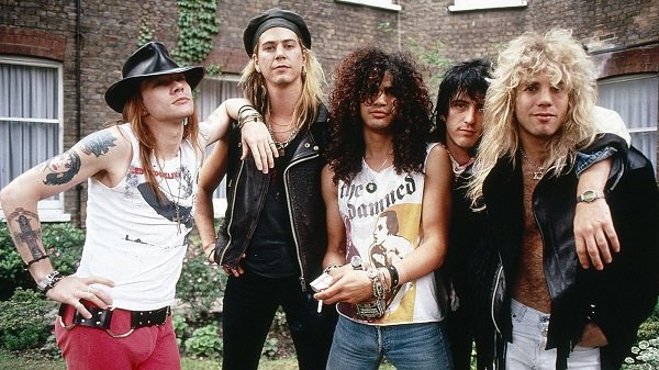 Guns N Roses.
This is a case of really just combining two existing band names into one. Hollywood Rose and L.A. Guns. Two bad ass sounding names that got pushed together to sound even more bad ass.