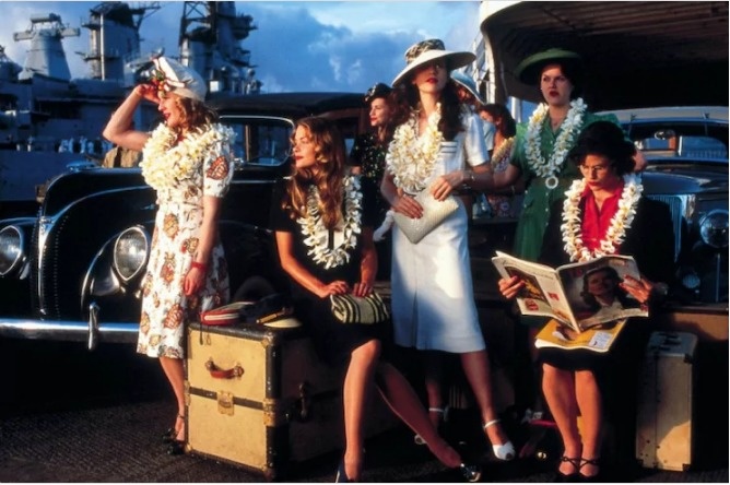 Pearl Harbor.
Prior to WWII no well-dressed woman would be caught without wearing nylon stockings. In the film which is set weeks prior to the attack on Pearl Harbor on December 7, 1941, the women are all seen with bare legs.