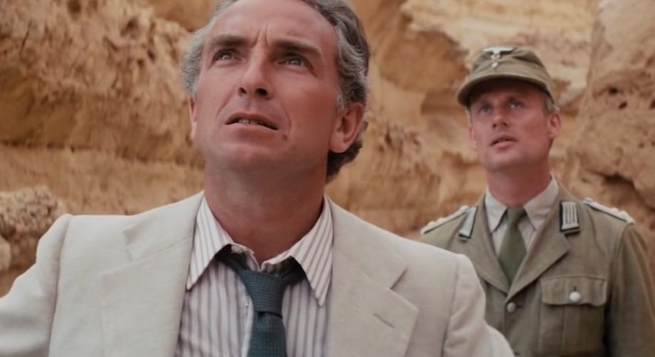 With Jones pointing a rocket launcher at Dr. René Belloq (Paul Freeman) in ‘Raiders of the Lost Ark,’ it may be hard to notice that a fly lands on Belloq’s face and makes its way into his mouth. The scene was never cut and made it into the finished film.