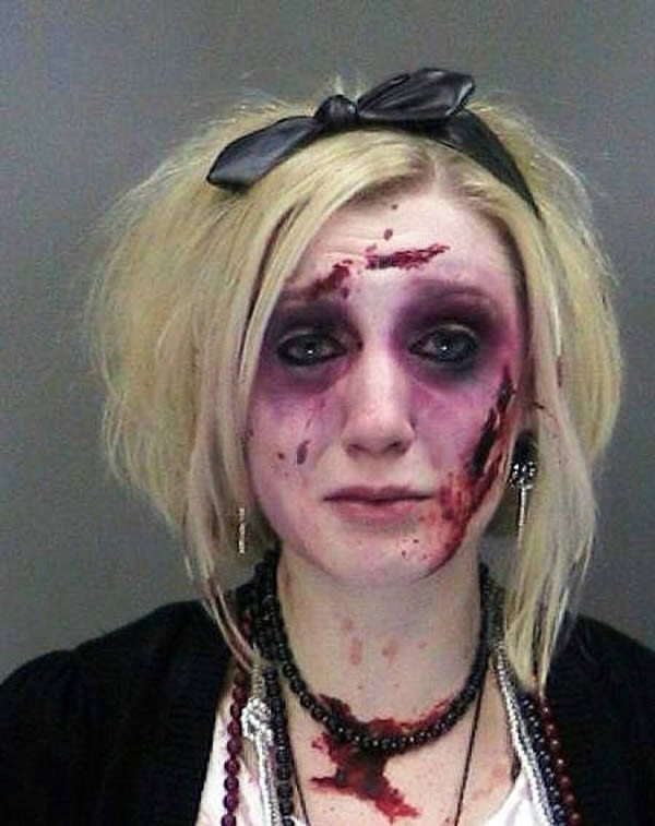 A woman in zombie makeup was arrested twice in just three hours for driving while drunk after attending Halloween party at a bar in 2014. 
Catherine Butler, 26, was initially arrested after leaving a zombie prom in a Rochester, New York. She posed for the mugshot with her face covered in fake blood. Police arrested her a second time on the same road three hours later. She was also arrested for DWI in 2006 and 2011.