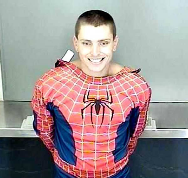 Spiderman doesn't look too sad about his arrest.