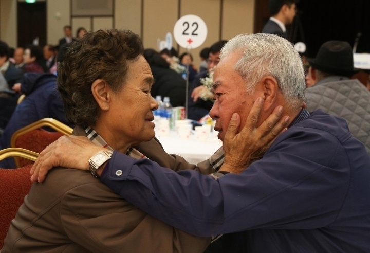 South Korean Lee Cheon-Woo filled with emotions as he becomes one of the 90 people who were finally reunited for a brief time with their North Korean relatives. Over 66,000 people are still on the waiting to list to see their loved ones.