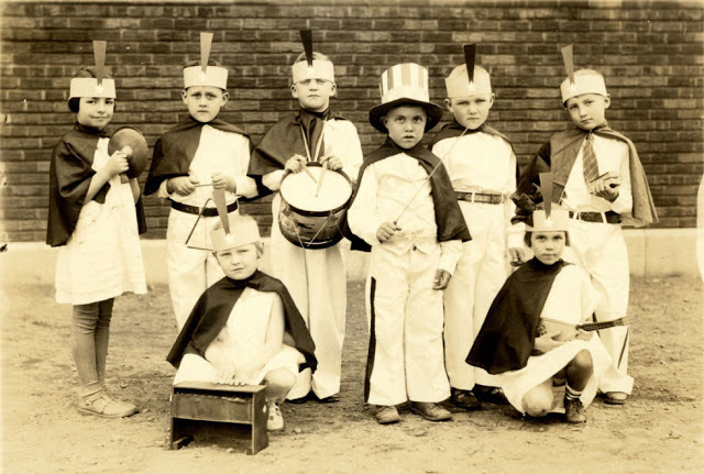 Here are a bunch of children looking forward to their Thanksgiving dinner back in 1910.