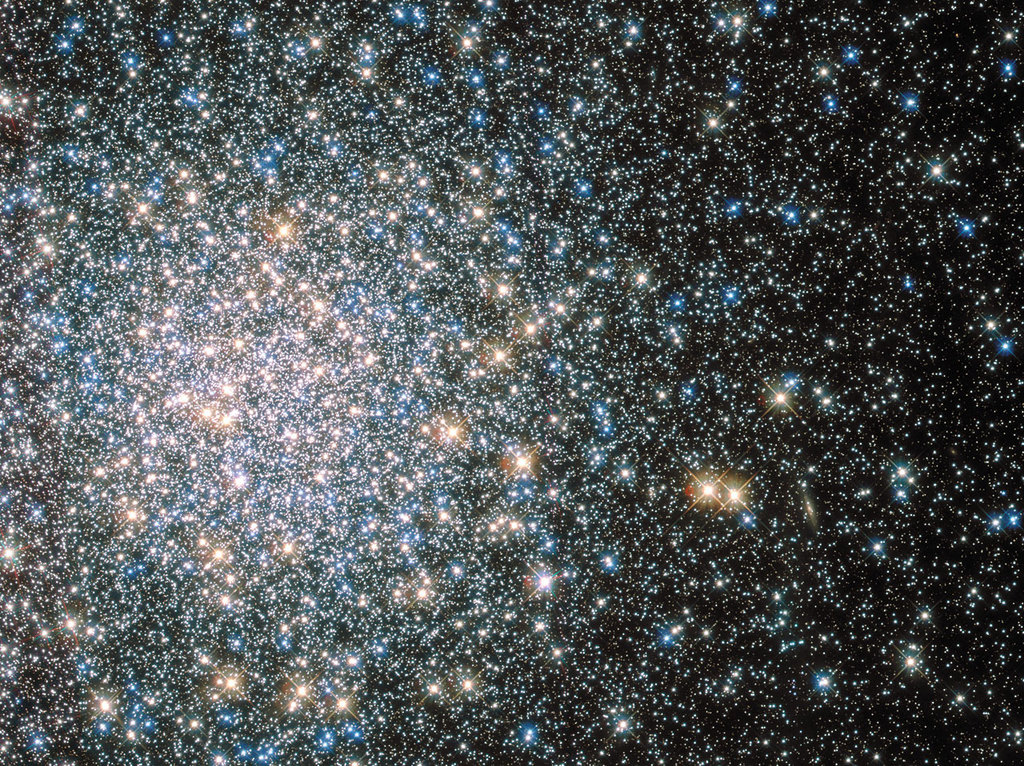 This sparkling jumble is Messier 5 — a globular cluster consisting of hundreds of thousands of stars bound together by their collective gravity. But Messier 5 is no normal globular cluster. At 13 billion years old it dates back to close to the beginning of the Universe, which is some 13.8 billion years of age.