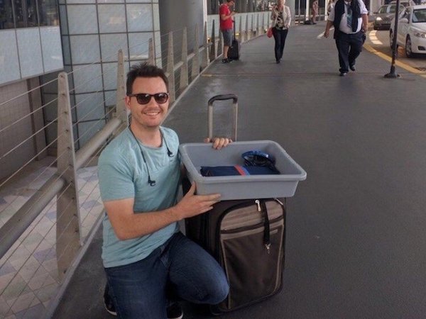 After one air going passenger was stopped and frisked by the TSA he decided to take some petty revenge on TSA and walk off with their bin as far as he could.