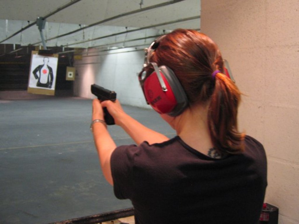 If you take someone to a gun range who has never shot before, stand no more than a foot behind them

This way they physically cannot turn around and accidentally point a loaded gun at you. Chances are they will try turn around to ask you a question if you’re teaching them, and many times they don’t think about the gun in their hands. Plus you can better see what they’re doing and coach them appropriately.