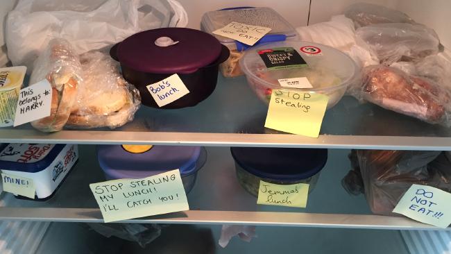 If you’re leaving food at work, take a bite before you put it in the fridge.

If the asshole that’s looking for free food sees you ate some of it they’ll spare your food. This only works for sandwiches.