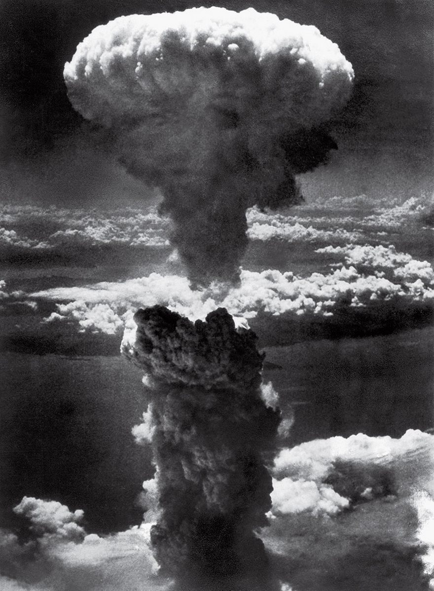 Mushroom Cloud Over Nagasaki, Lieutenant Charles Levy, 1945.
The U.S. bombed Hiroshima on Aug. 6, 1945, and three days later, it bombed Nagasaki. The latter is pictured here. You're looking at a 45,000-foot cloud of radioactive particles.

"It was purple, red, white, all colors—something like boiling coffee. It looked alive, " Lieutenant Charles Levy, bombardier, described the scene. The death toll was estimated at 80,000.