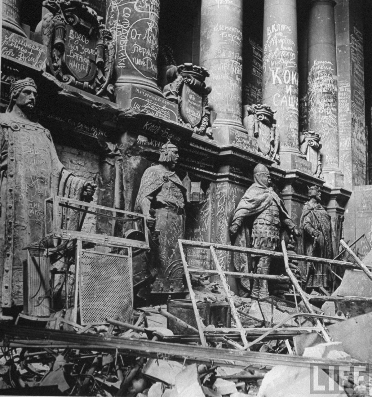 The Reichstag covered in graffiti after being seized from the Nazis by the Red Army, 1945.

After seizing the Reichstag in May 1945 and raising their flag on its roof, Soviet soldiers left their marks in other ways, writing their names, feelings, thoughts and hometowns on the walls of the famous building. Written in Cyrillic script, they include such slogans as “Hitler kaputt” and names of individual soldiers. Most of the writings are just “From [Russian City] to Berlin” or just “[Russian City] – Berlin” with a name or “Kilroyski was here”.