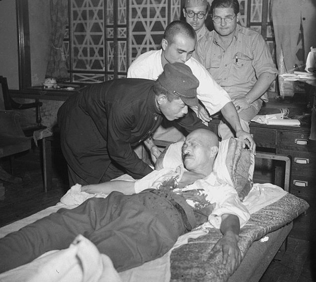 Japanese war criminal, Tojo Hideki, attempted suicide after the surrender. He was saved and resuscitated by Allied forces, who then hanged him –  September 8, 1945.

After recovering from his injuries, Tojo was moved to Sugamo Prison. While there he received a new set of dentures made by an American dentist. The phrase “Remember Pearl Harbor” had been secretly drilled into the teeth in Morse code.