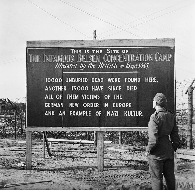 A sign erected by British forces at the entrance to Bergen-Belsen concentration camp. 29 May 1945