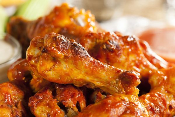 Chicken wings are a "hot" item on the black market and have been stolen in large quantities on more than one occasion. 

In 2015, a father and son, Paul Rojek, 56, and Joshua Rojek, 33, both of Syracuse, stole more than $40,000 worth of wings from a New York restaurant where they worked and sold them on the street, or to other businesses. Both men were employed as cooks when they placed numerous wing orders with the restaurant's wholesaler. Officials say the Rojeks would later pick up the orders and resell them at a reduced price.

Two years earlier, Renaldo Jackson and Dewayne Patterson, of Gwinnett County, Georgia, stole $65,000 in frozen Tyson chicken wings from Nordic Cold Storage where they worked. One five-pound bag of frozen chicken wings sells for about $12.50—if you do the math, that's about 26,000 pounds of wings. Maybe they were hosting a pretty big Super Bowl bash?