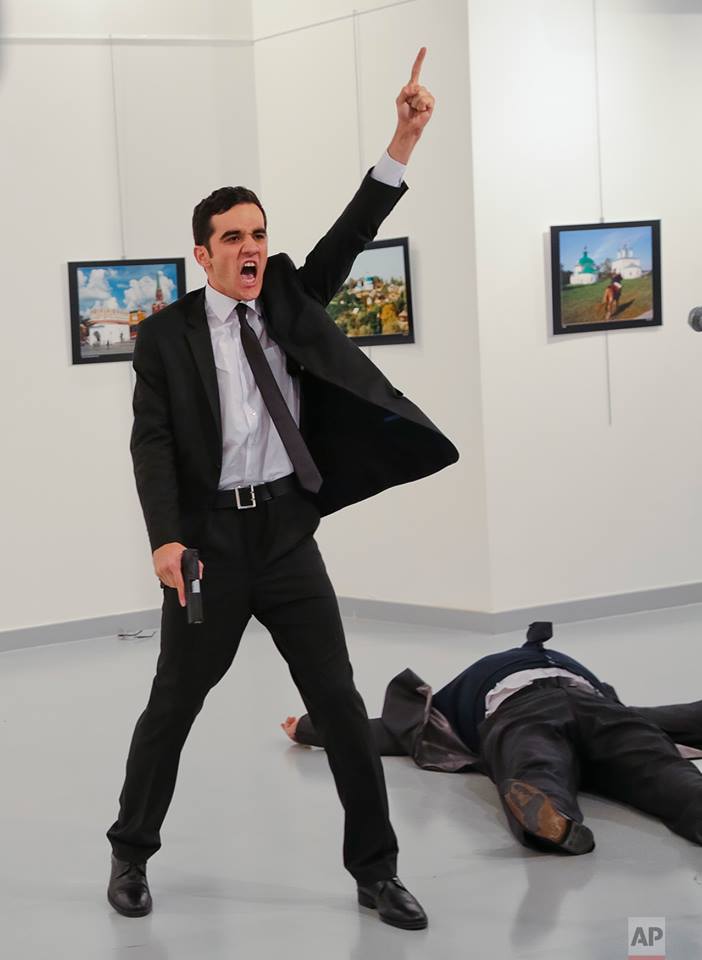 The assassin after shooting Russia’s ambassador to Turkey