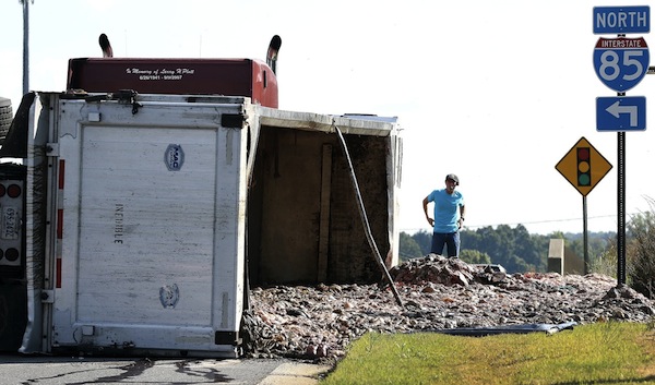 Nowhere near as touching a story as #4, a tractor-trailer carrying pig intestines spilled exiting the off ramp of Interstate 85 South onto Belmont-Mount Holly Road in Gaston, North Carolina, in October 2016. The spillage created a stench that could be described as pork-scented garbage. 

You may wonder what pig intestines are used for. According to Belmont Police Sgt. J.B. Quinn, "Dog food, and some products are used in makeup, or human food. It's a large variety. Some of it is just waste."